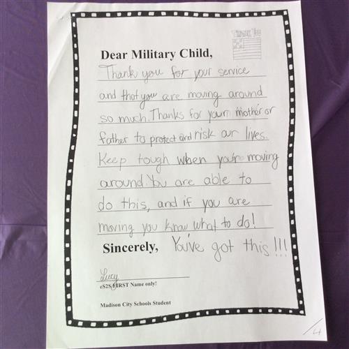 Closeup of a letter thanking military for their service and willing to move around frequently to protect us 